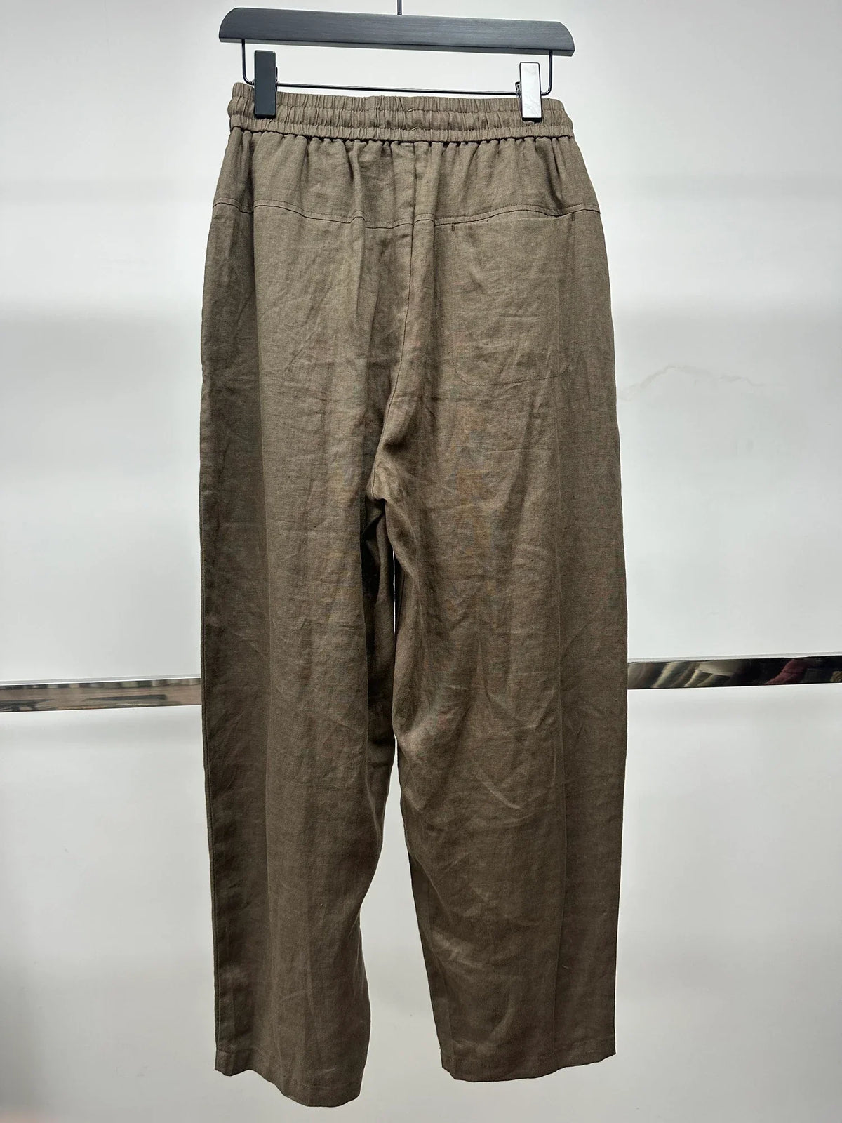 Taupe relaxed trousers — Original back photograph — Taupe relaxed trousers