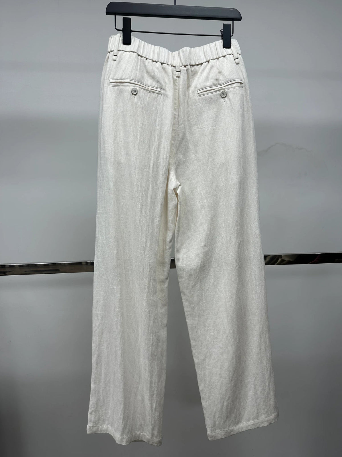 Ivory button-front trousers — Original back photograph — Ivory button-front trousers