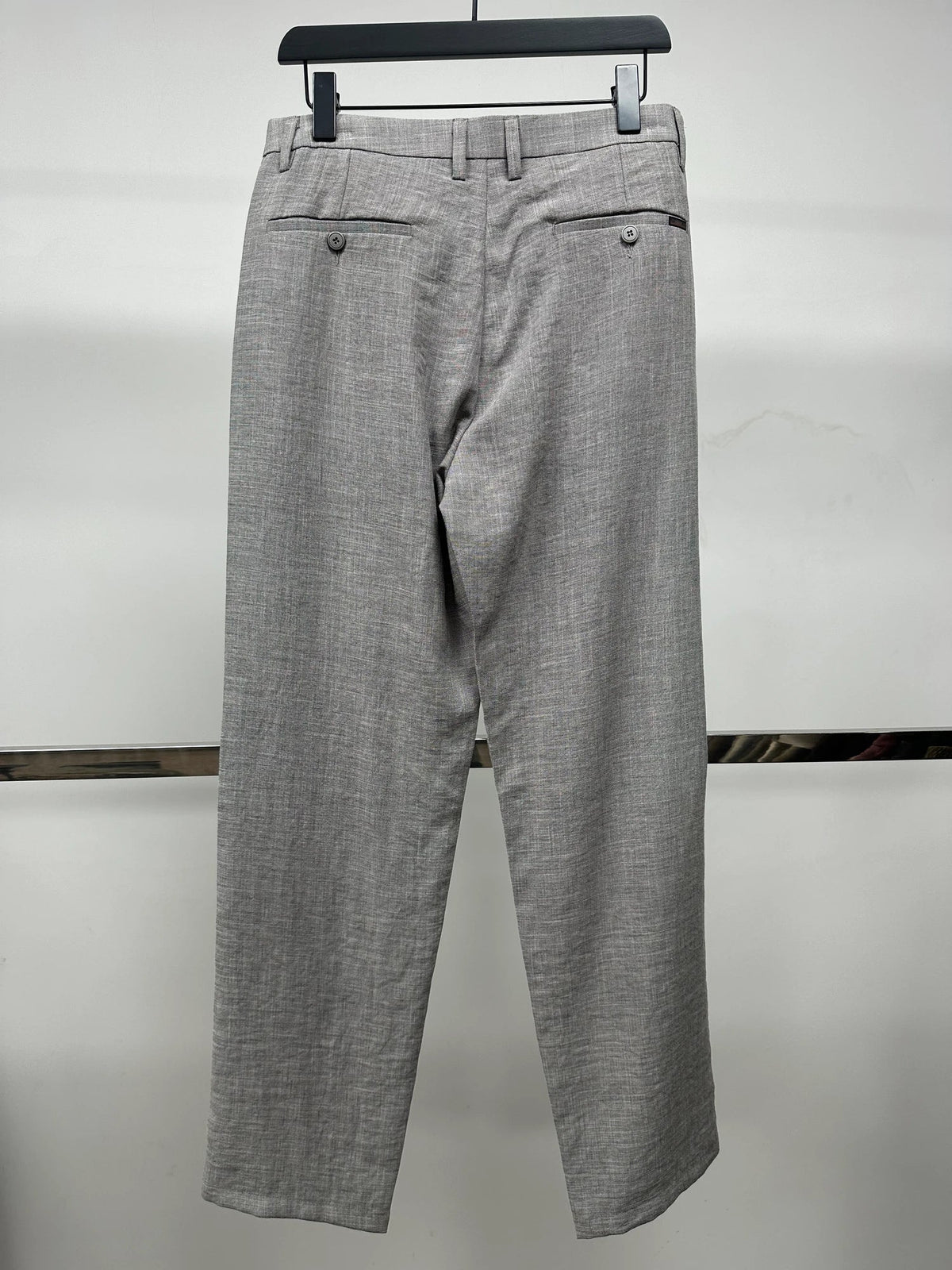 Grey pleated trousers — Original back photograph — Grey pleated trousers