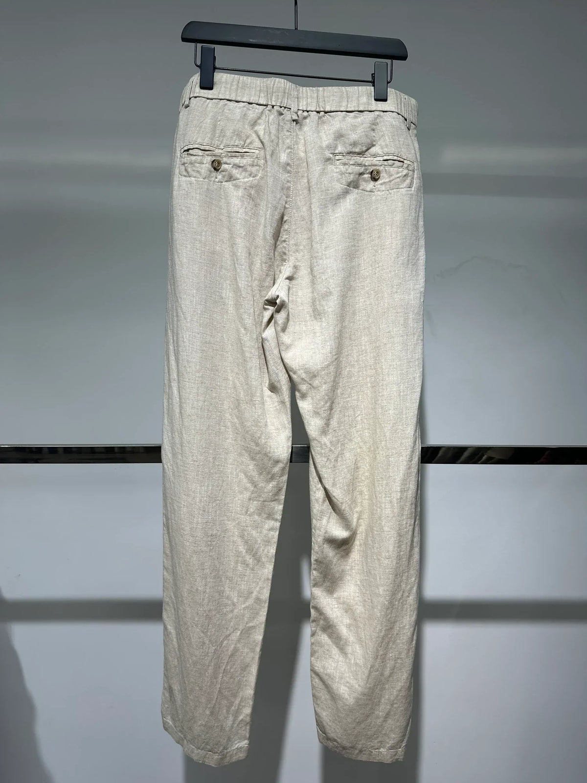 Sand button-front trousers — Original back photograph — Sand button-front trousers
