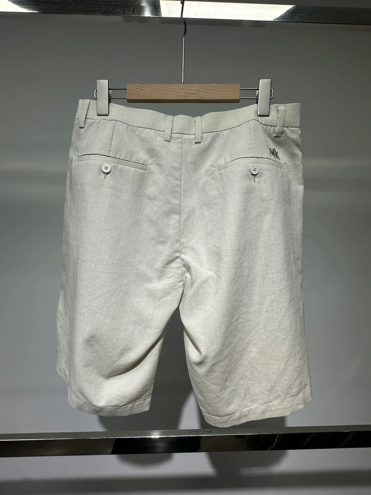 Ivory pleated shorts — Original back photograph — Ivory pleated shorts