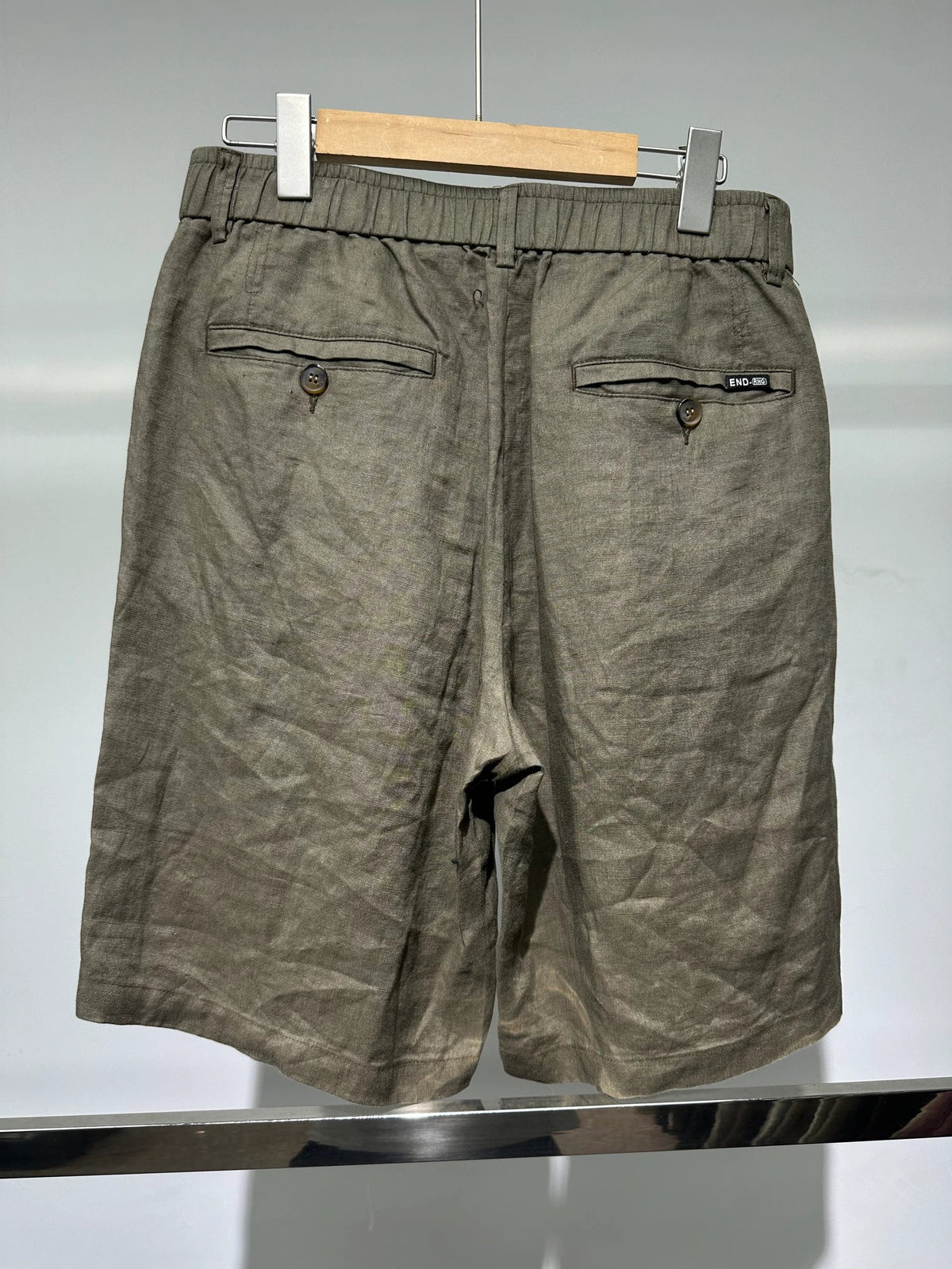 Olive button-front shorts — Original back photograph — Olive button-front shorts