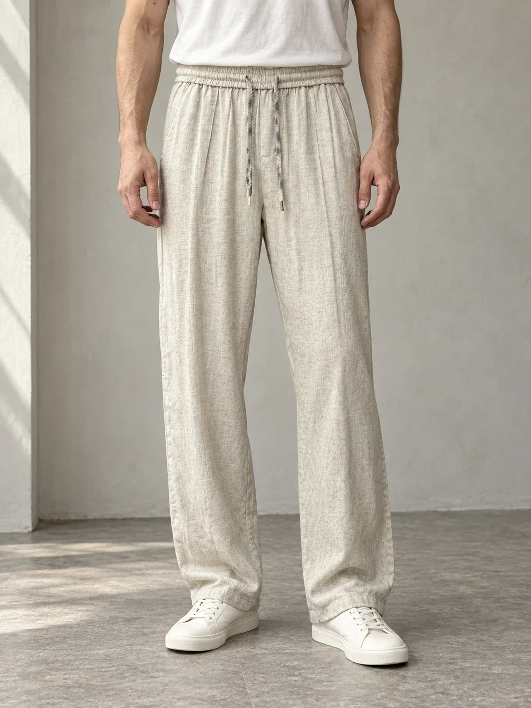 Sand drawcord trousers — AI-generated model styling